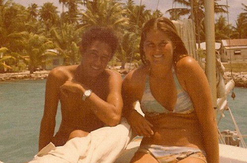 Tomai and Neva sitting onboard Patience, Penrhyn, Cook Island atoll, 1976